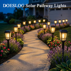 DOESLAG pathway light along garden border provides subtle landscape lighting.