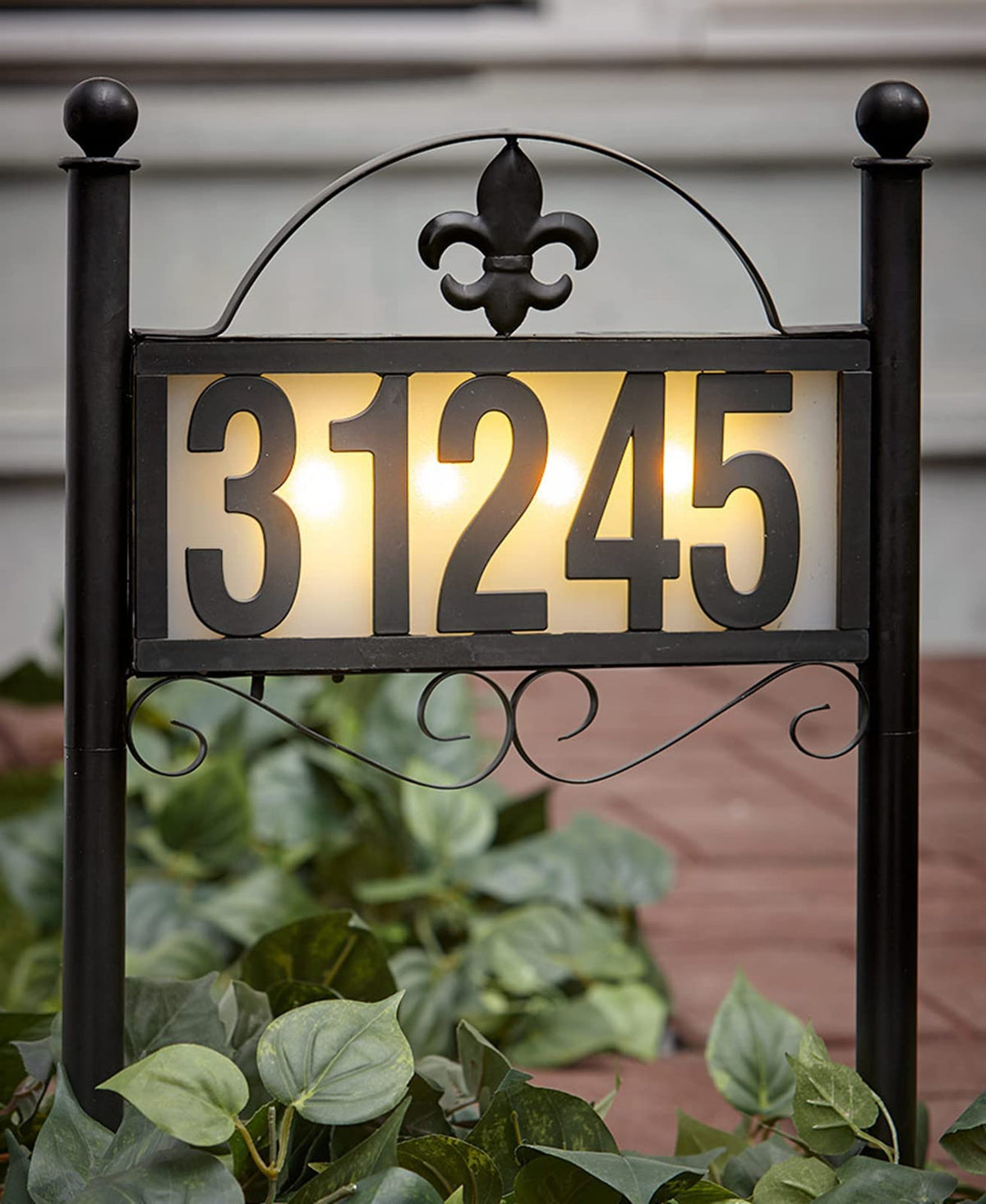 DoinMaster solar metal address sign in yard showing 50 numbers for clear nighttime visibility