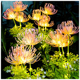 DooYard Solar Garden Lights bloom LED in focus, creating a magical nighttime glow