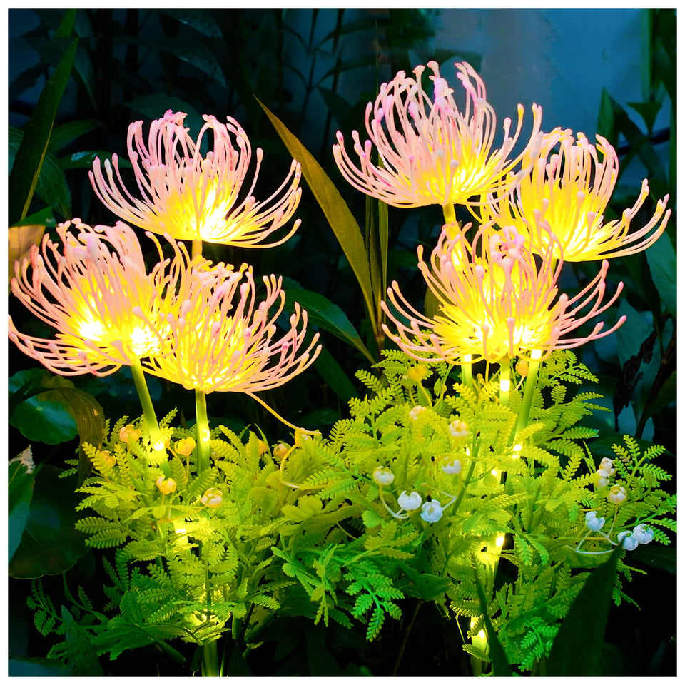 DooYard solar garden lights glow softly in flowers at night for magical outdoor ambiance.