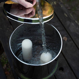 DOULTON candle next to system; precise fit ensures reliable filtration flow.