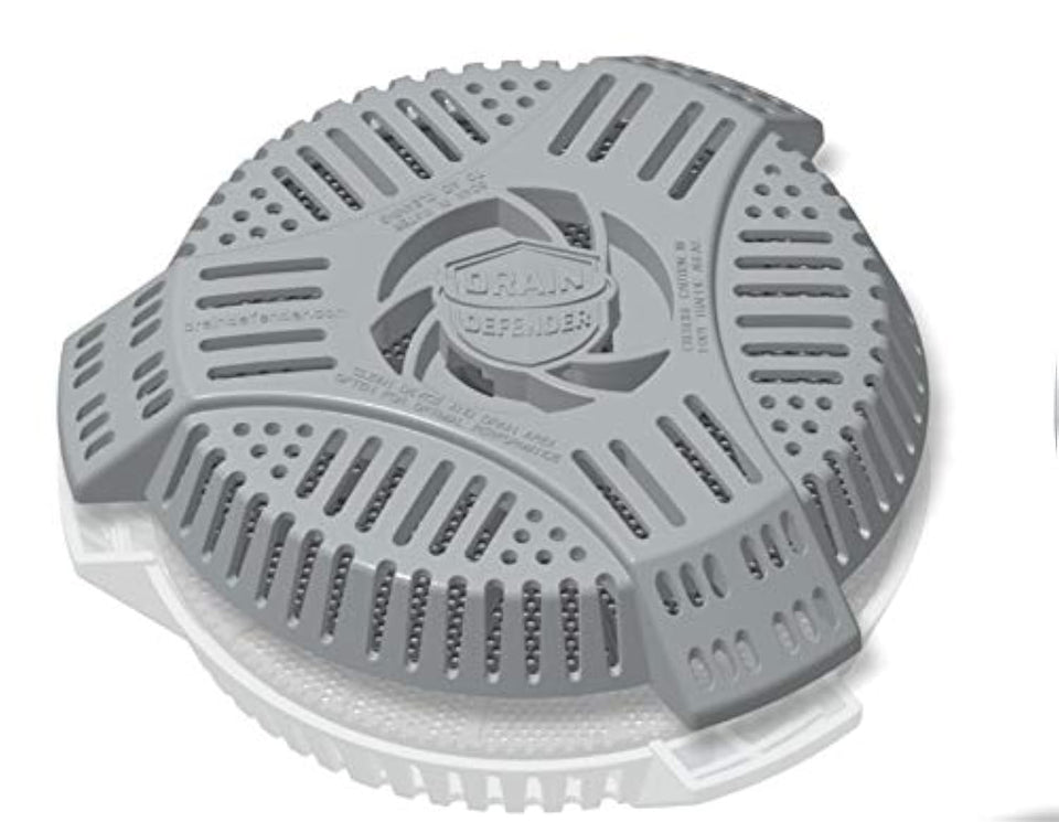 Drain Defender outer barrier blocks yard debris from stairwell drains