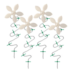 DrainWig white flower hair catcher sits over drain to prevent clogs