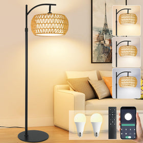 DRAWNCAT Boho Rattan Arc Floor Lamp base with a heavy, stable disc for steady setup.