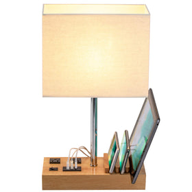 Dreamholder desk lamp showing AC outlets to power laptops and printers.