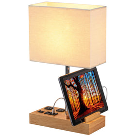 Dreamholder desk lamp with cream linen shade delivering soft reading light.