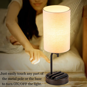 Lamp features built-in AC outlet for powering small devices