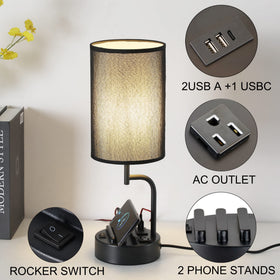 Dreamholder lamp features built-in phone holders to keep devices organized while charging.