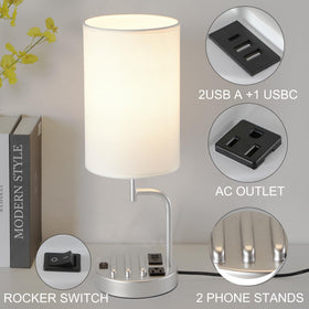 Dreamholder silver metal-base lamp complements modern desks while charging.