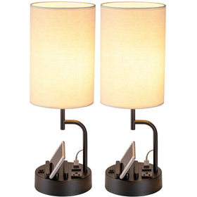 Dreamholder table lamp with USB ports and AC outlet for bedside charging.