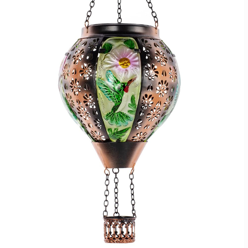 DREAMSOUL hummingbird glass balloon lantern glows softly at dusk, enhancing garden ambience.