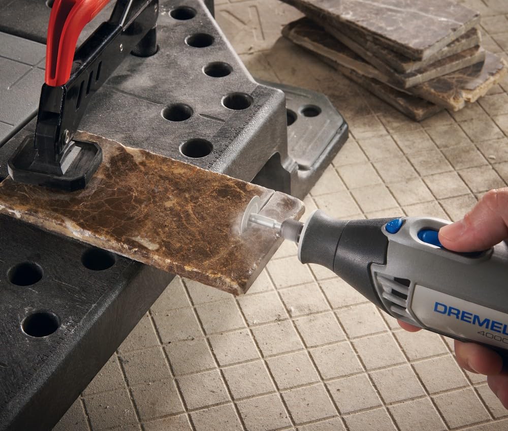 Dremel 545 Diamond Wheel with mandrel included for easy setup.