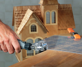 Dremel 670 Mini Saw includes directional guide showing cut direction and line for accuracy.
