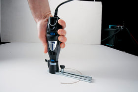 Dremel 678 quick-attach design for tool-free setup.