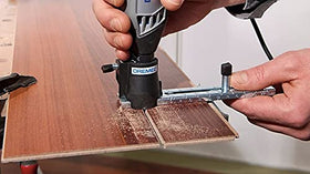 Dremel 678 kit contents include guide and circle cutter.