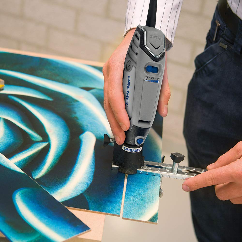 Dremel 678 straight edge guide enables straight-line routing.