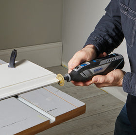 Dremel 8250-5 on wood demonstrates task versatility