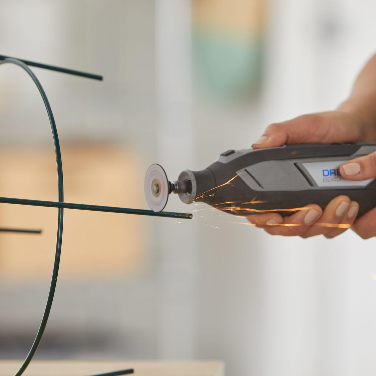 EZ Lock system enabling six times faster accessory changes on a Dremel setup.