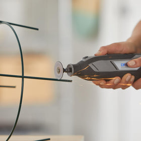 EZ Lock system enabling six times faster accessory changes on a Dremel setup.