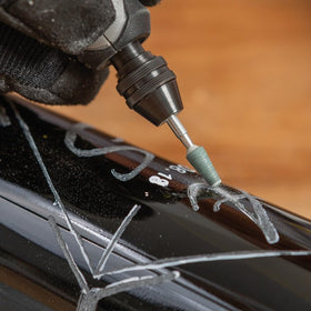 Dremel glass etching scene illustrates delicate designs and smooth surface finish.