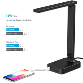 Drevet desk lamp with two AC outlets powers devices while studying.