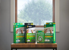 Clear film on a window, showing unobstructed view through insulated glass with Duck product.