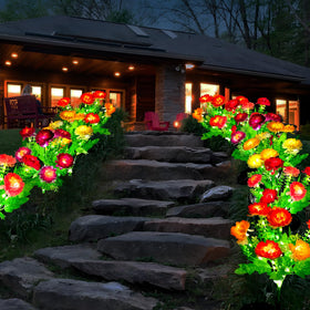 DUODEAN Solar Flowers Lights glow at night along a garden border for ambiance.