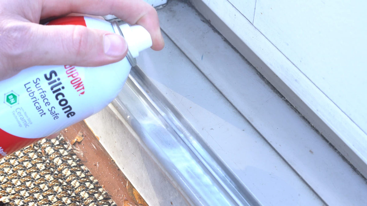 DuPont silicone lubricant on metal and wood surfaces reduces friction and wear
