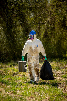 DuPont Tyvek 400 coverall with chin-zip hood eases donning and removal