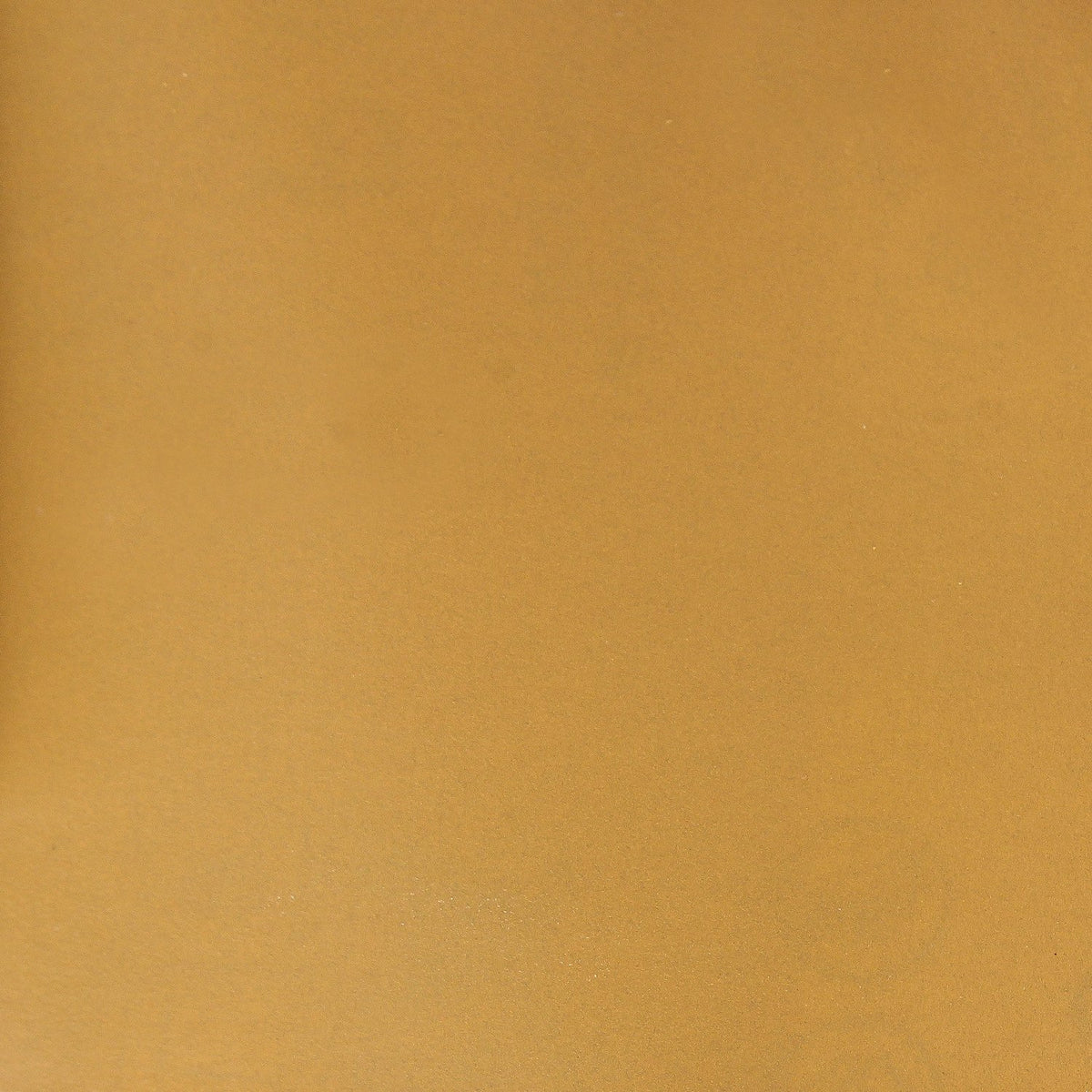 Dura-Gold adhesive-backed sandpaper ready for air files and blocks.