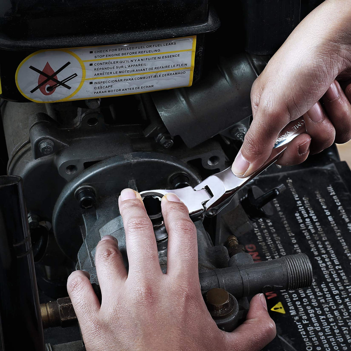 Wrenches being used in a tight automotive install scenario with DURATECH tools.
