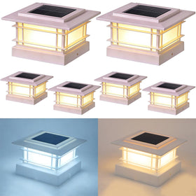 Dynaming 4x4 solar post cap lights on wooden posts brighten outdoor spaces.