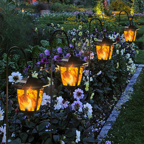 Dynaming outdoor lights decorate walkways and porches with modern flair.