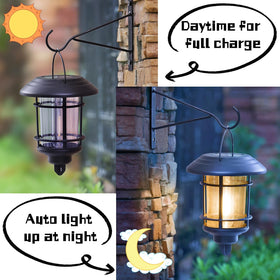 Dynaming outdoor LED lanterns provide a soft warm white glow for garden evenings
