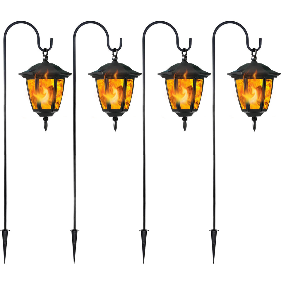 Dynaming solar flame lanterns glow along the patio at dusk for welcoming ambiance.