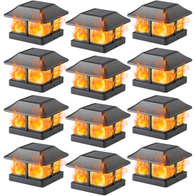 Dynaming solar flame post-cap lights front view showing warm flickering glow for pathways