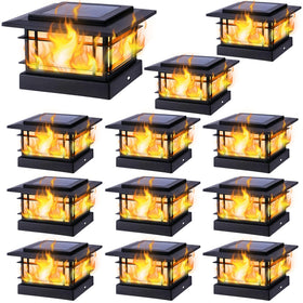 Dynaming solar post-cap light with flame close-up adds warm ambiance to 4x4 posts.