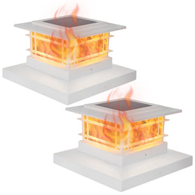 Dynaming solar post cap light with flickering flame on a 4x4 wooden post.