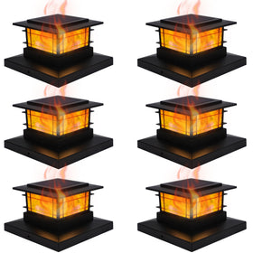 Dynaming solar post cap light with flickering flame creates warm garden ambiance