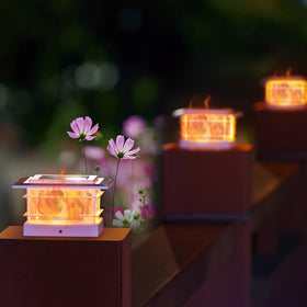 Evening illumination along a patio railing with a soft glow