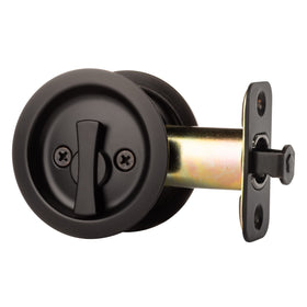 Dynasty Hardware pocket door latch being installed on an interior door for privacy