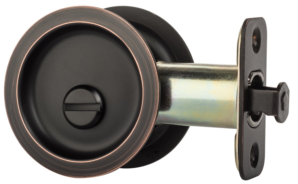 Close-up of Dynasty Hardware round privacy pocket door latch