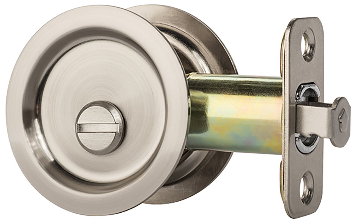 Dynasty Hardware round privacy latch with locking pull for secure interior doors.