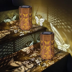 Eandisom butterfly solar lanterns illuminate garden paths with warm, energy-saving glow