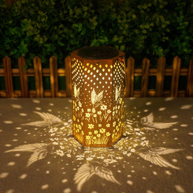 Eandisom garden-hanging lantern provides warm ambient outdoor light.