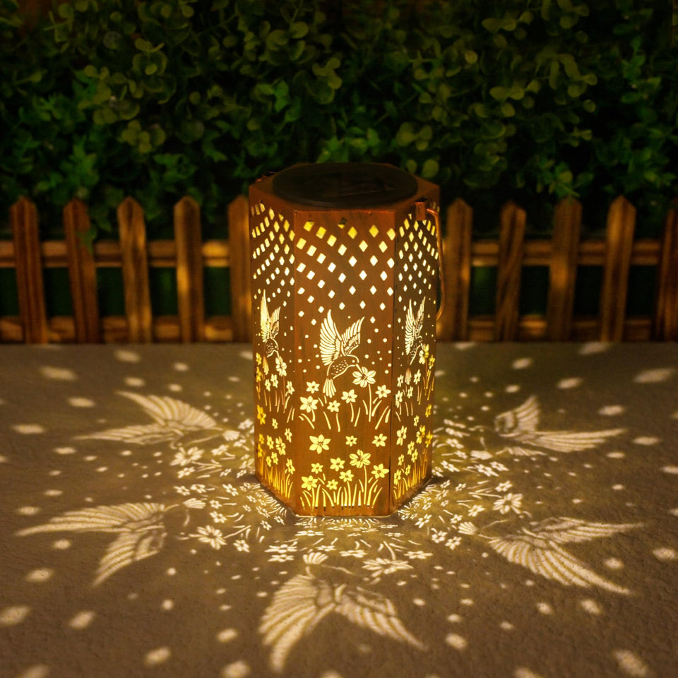 Eandisom garden-hanging lantern provides warm ambient outdoor light.