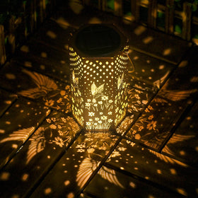 Eandisom gold-copper-pattern solar lantern adds decorative glow.
