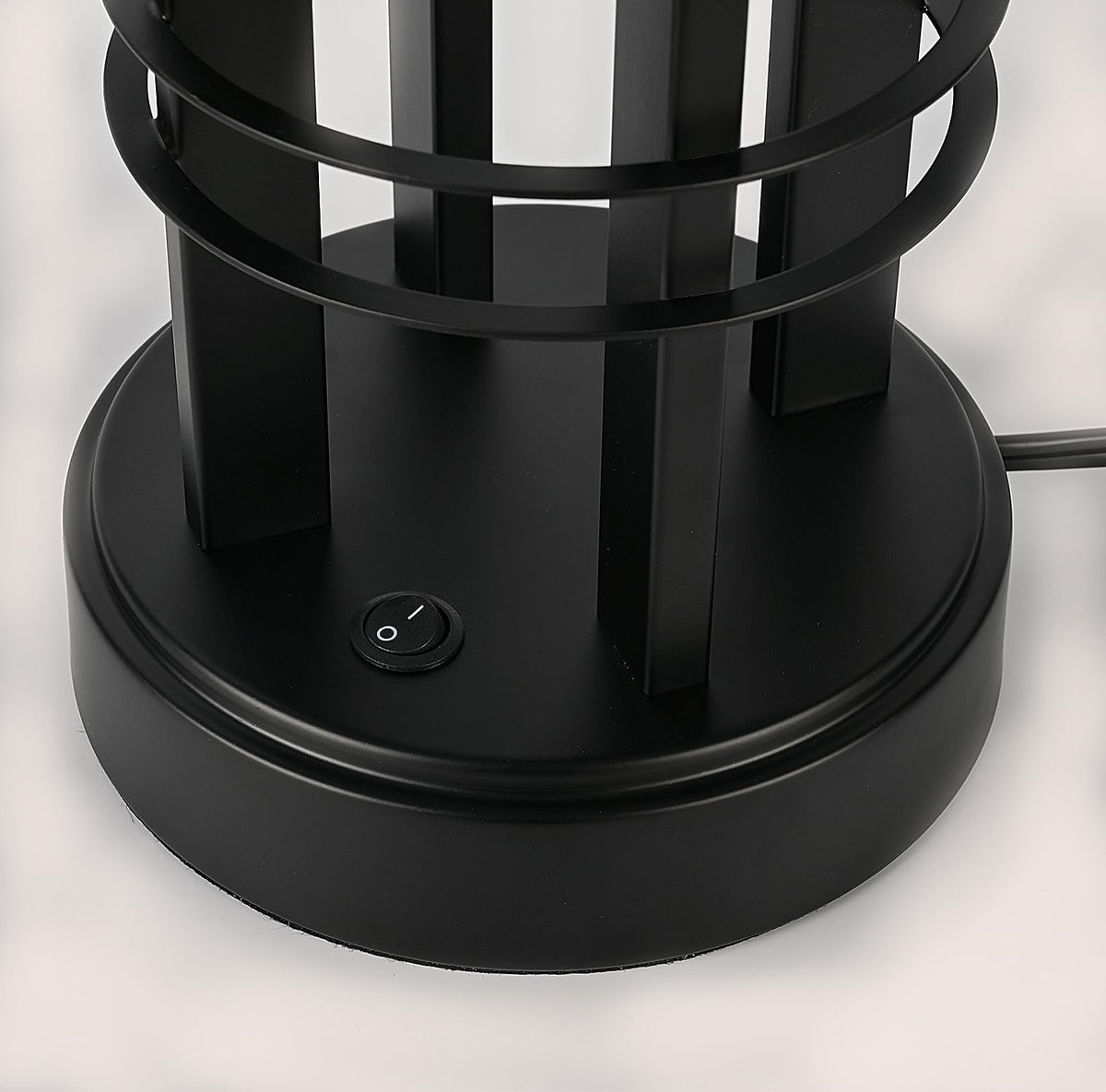 Bedside Easebri lamp on end table, perfect for reading in bed.