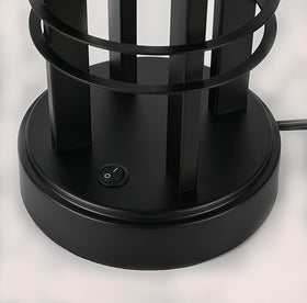 Bedside Easebri lamp on end table, perfect for reading in bed.