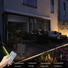 echosari solar strip lights around tree line add subtle glow and focal interest.
